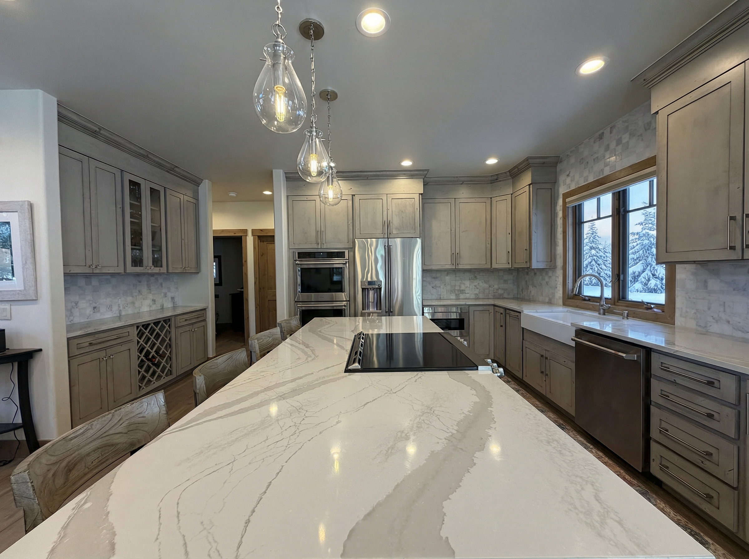Kitchen counter and island with pendant lighting